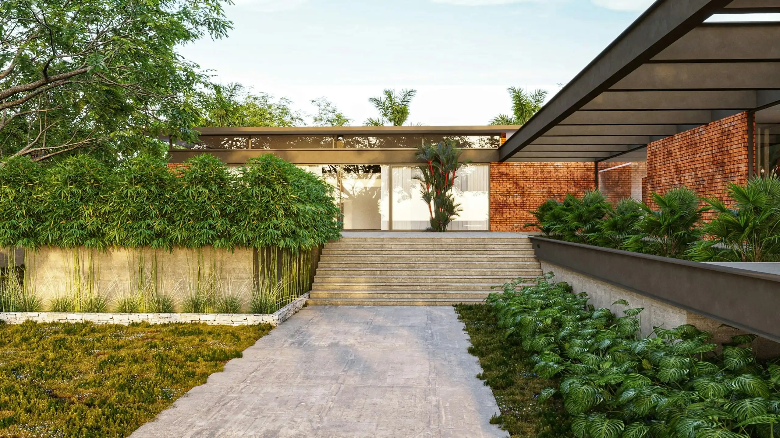 A long paved courtyard with low planting either side, leading to a glass-fronted house